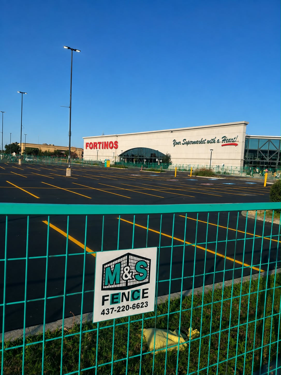 M&S Fence temporary fencing installed at Fortinos supermarket parking lot