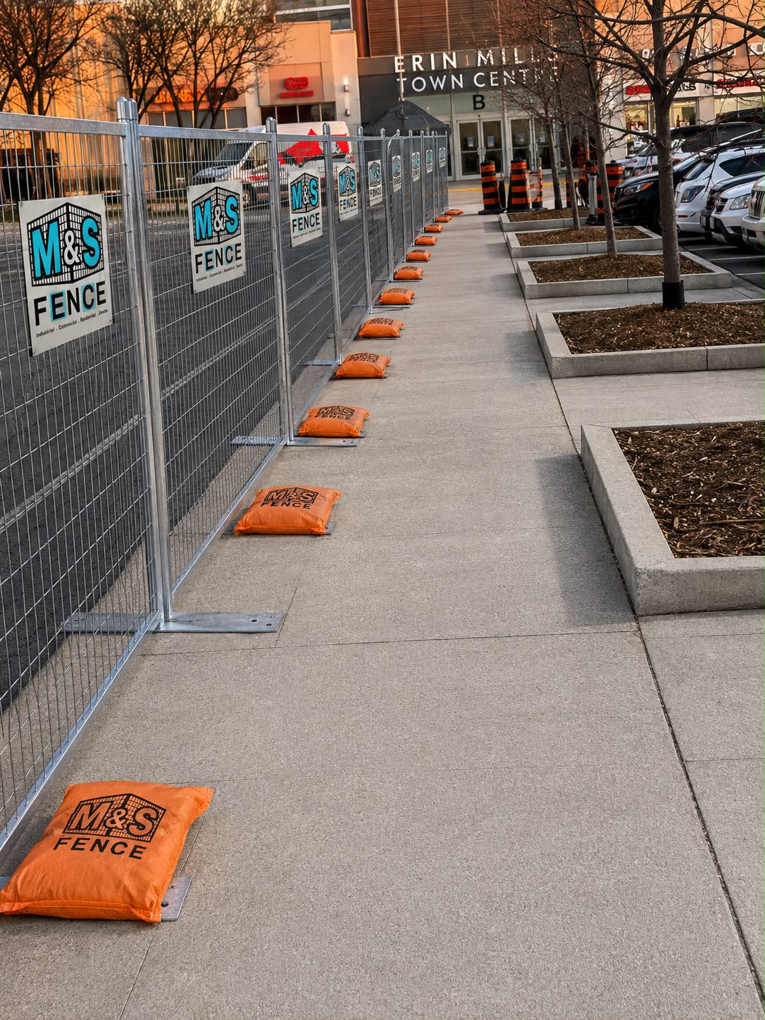 M&S Fence sandbags used to stabilize temporary fence panels