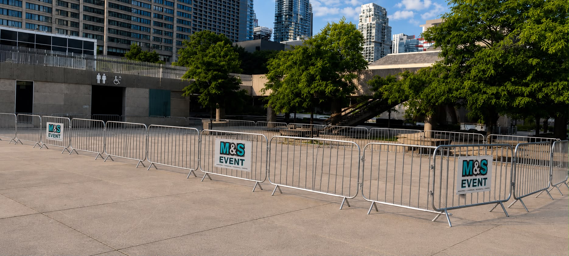 Temporary perimeter fencing installed around an outdoor event site