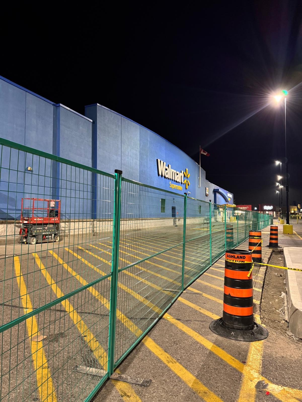 Temporary fencing installed around a commercial retail property
